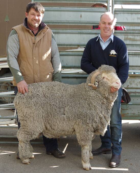 Trent Anderson, St Katherine's, Darriman, who paid $5000 for the top priced horned merino ram, with breeder of the ram, Steve Harrison, Bindawarra Merino Stud. 