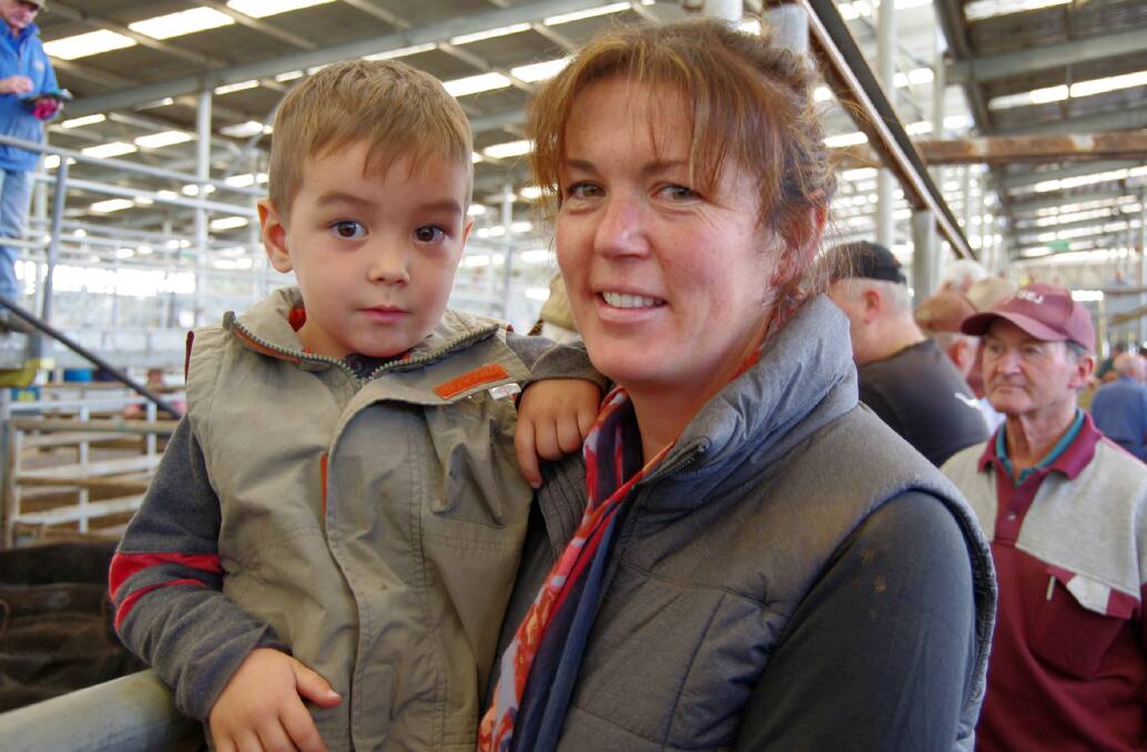 Spencer McCrorey (3) with his aunt Lesley Hasthorp, Tanjil South, who sold rising-two-year-old steers and heifers on Thursday at Leongatha.