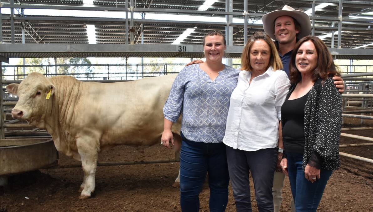 TOP-PRICED BULL: Sapphire Halliday, Waterford Charolais, Mount Macedon, with Anne Cochran and Rob Abbott (centre), Mount William Charolais, Willaura, and Deborah Halliday, Waterford.