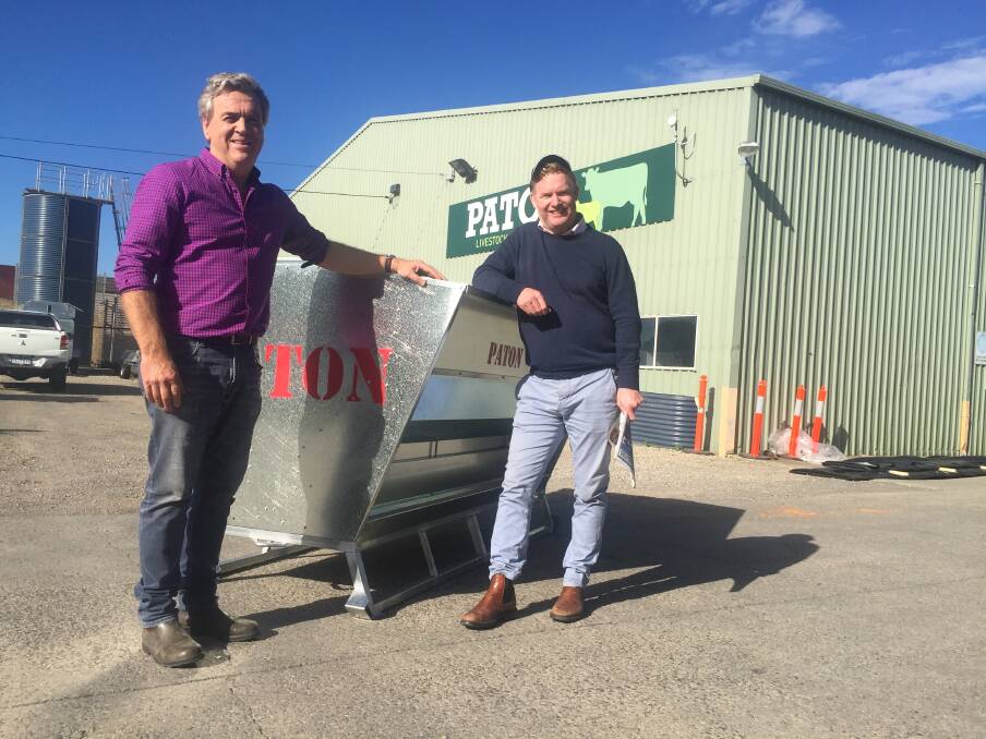 SHEEP WEEK PRIZE: Nick Luxton, Paton, contributed a Premium Paton 1.5 Tonne Trail Feeder to be won during Stock & Land Sheep Week. He is pictured with Stock & Land stud stock representative Justin Conlan.