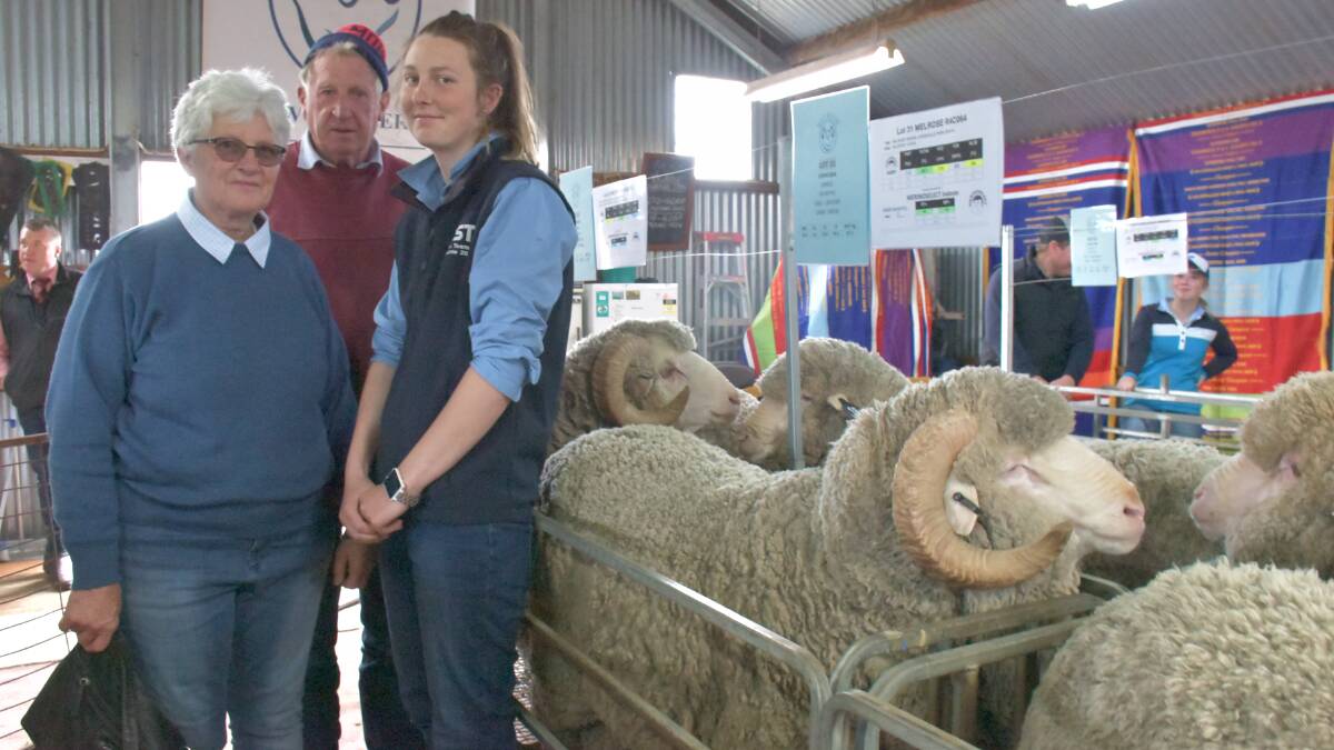 VOLUME: Return clients of over a decade, Kerry and Bob Ferrier, pictured with granddaughter Jasmine, Coleraine, bought three rams at the sale.