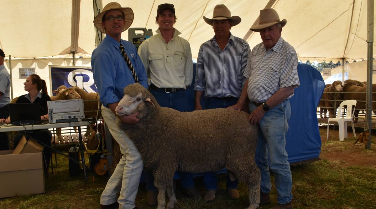 TOP RAM: Rodwells Boort and Bendigo auctioneer Nick Byrne, with top-priced buyers Duncan and Lane Hodgson, 'Arundel', Kyalite, NSW, and Fox & Lillie business development manager Adrian Flint, with the top-priced ram.