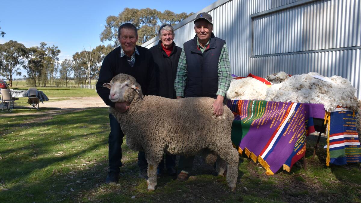 Kerrilyn Merinos stud principal Norm Weir, with top-priced buyers Stan and Mavis Shay, Moliagul, and their equal top-priced ram.