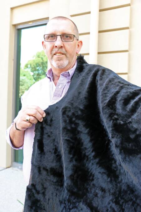 PKF Skin Valuations principal Paul Fitzsummons, Adelaide, SA, with mouton made from Australian lambskins for the Russian market.