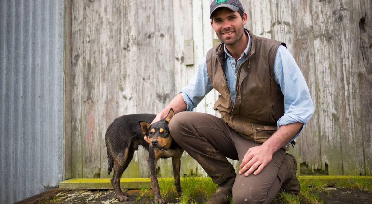 MAN'S BEST FRIEND: Jandre Slabbert, Digby, and his two-year-old kelpie Rex, are one of the Victorian entries in the Cobber Challenge, a nationwide search for Australia's hardest working dog. Rex helps herd sheep between paddocks.