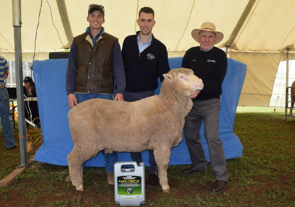 Lane Hodgson, Arundel Station, Kyalite, NSW, Ben Stace, Fox & Lillie, and Panorama stud principal Frank Byrne, with the top-priced ram, that was snapped up at $2700.