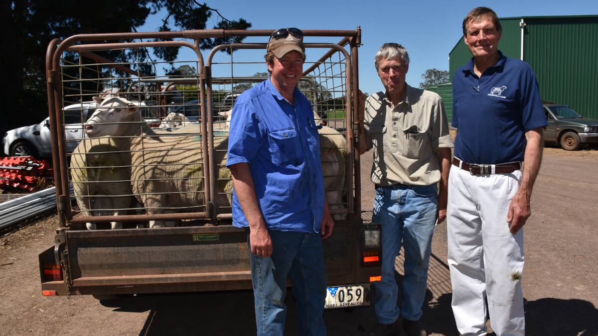 Kym and John Lyons, Melville Forest, took home 12 White Suffolk rams. They are pictured with Wakefield Park stud co-principal Gary Wake.