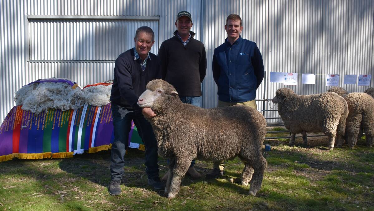 Kerrilyn Merinos stud principal Norm Weir, with top-priced buyer and first-time buyer John Baker, Bamganie, and Jason Rothe, Australian Wool Network.