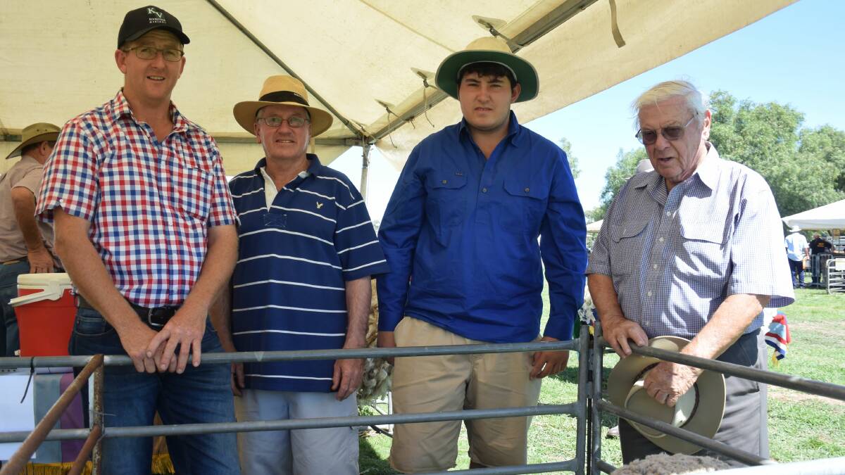 Alan Harris, Koole Vale, with three generations of the McCrae family, Warren, Jack and Rodney, Oakbank Merinos, Marnoo, at last year's Loddon Valley District Stud Merinos Field Day central display at Serpentine.