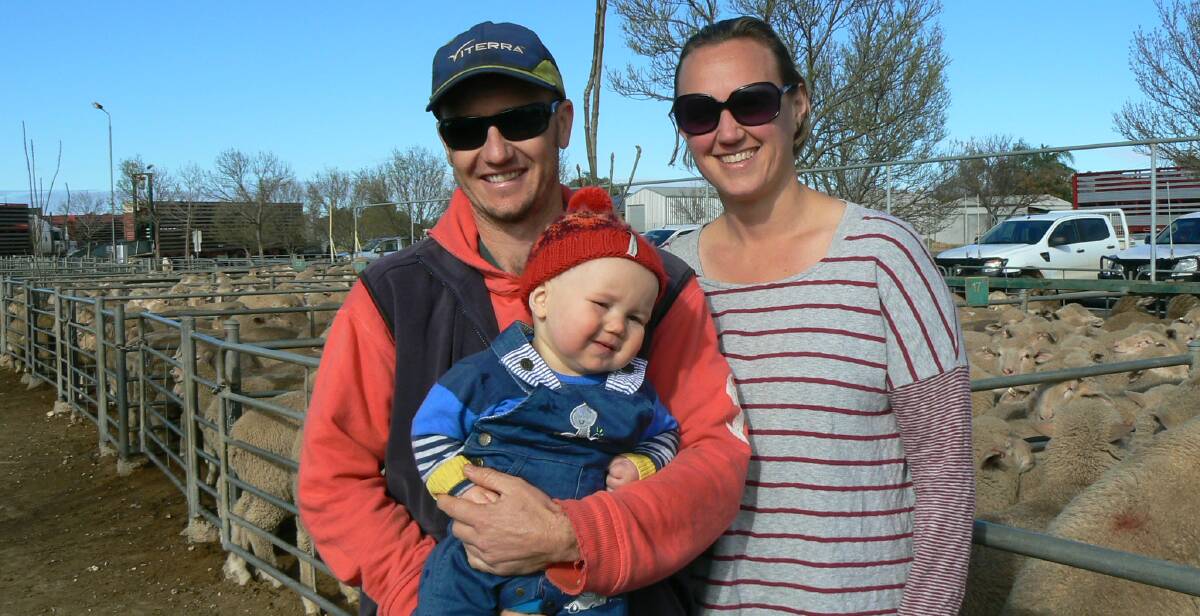 TO MARKET: Ross, Kate and Paddy Stone from Walpeup took in Monday's Ouyen market, where there was a smaller overall yarding of 5978 old lambs. 