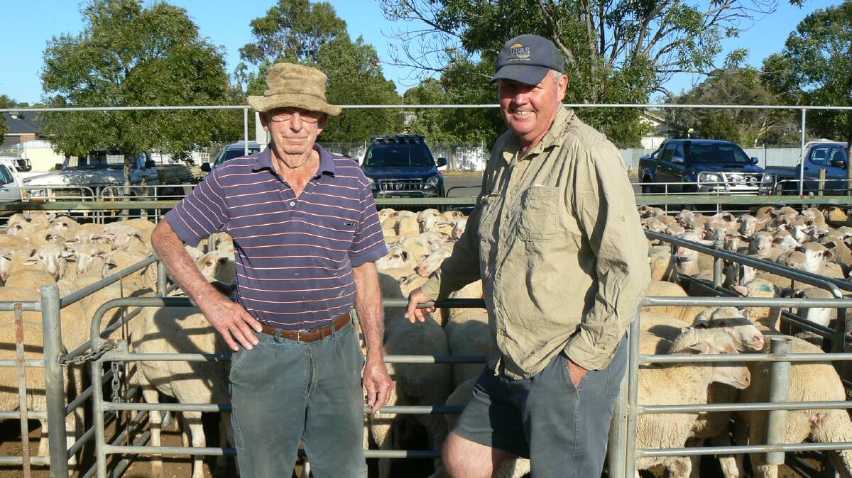 WATCHERS: Bert Holland from Ouyen and Clive Young from Patchewollock attended last Thursday's sale at Ouyen, where all weights and grades of lambs were $5-$10 dearer. Large consignments of mutton sold to strong competition.