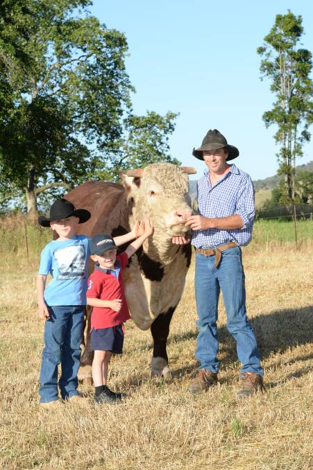 Andrew Klippel, Sugarloaf Creek Herefords, Corryong, Victoria, with his children Layne, 9 and Mackinley, 4. 