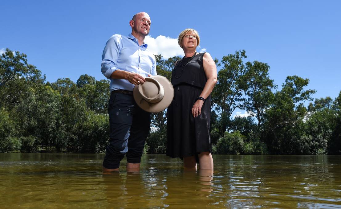 NSW water minister Niall Blair and Victorian water minister Lisa Neville met on the banks of the Murray River on Friday determined to get a better deal for Murray Darling Basin communities. Picture: MARK JESSER