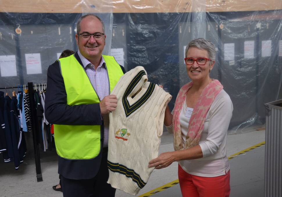 SA PRODUCT: Minister for Agriculture, Food and Fisheries Leon Bignell, and Silver Fleece director Cathy Barton, proudly display an Australian cricket jumper, which is made using SA wool.