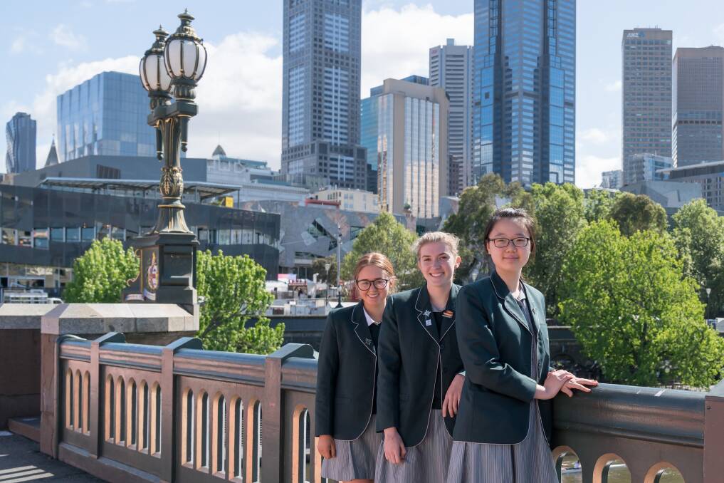 Cec (centre) enjoys a city trip with fellow boarders Annalise and Fiona.​