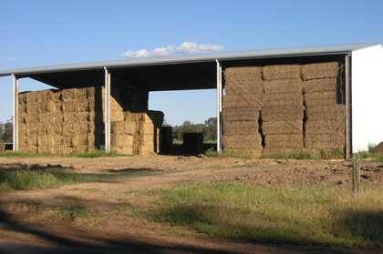 Managing baled hay around rain