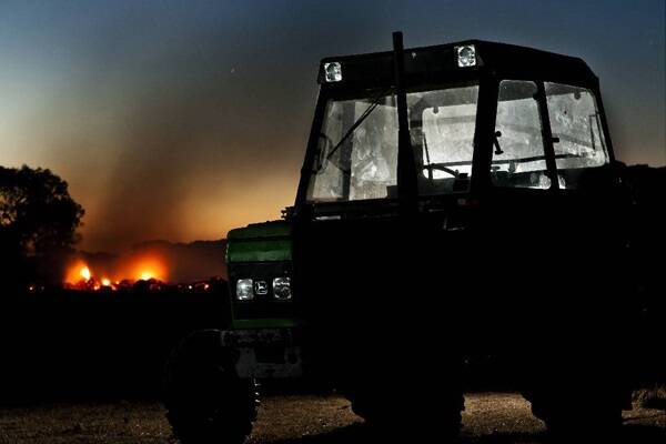 Tractor sparks fire on KI