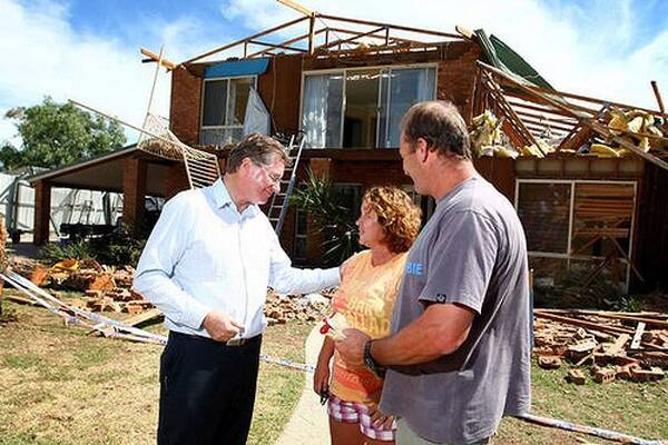Victorian Premier Denis Napthine meets Leonie and Kelvin Weston-Green at their Bundalong home which was extensively damaged in a tornado. Photo: Matthew Smithwick 
