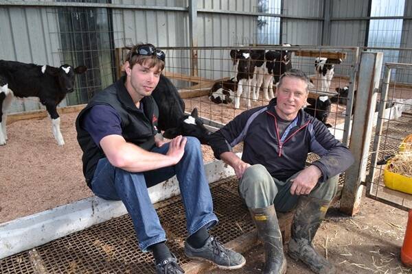 Neerim South dairy farmer Chris Kelliher, pictured with farm-worker Michael Pridmore, at last week's YDDP calf-rearing tour of Gippsland.