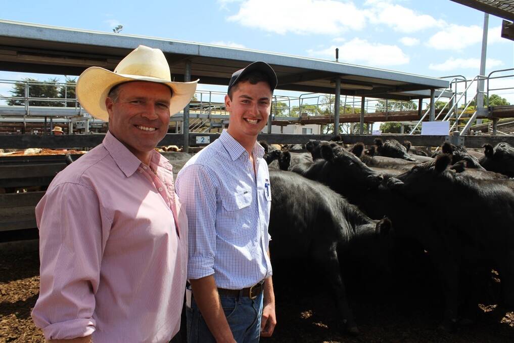 TFI livestock buyer Steve Chapman and Kerr and Co agent Zac Van Wegen with Murroa East Pastoral 16 Angus steers, weighing 413kg, 16 month-old, by Weeran bulls that sold to 201c/kg.