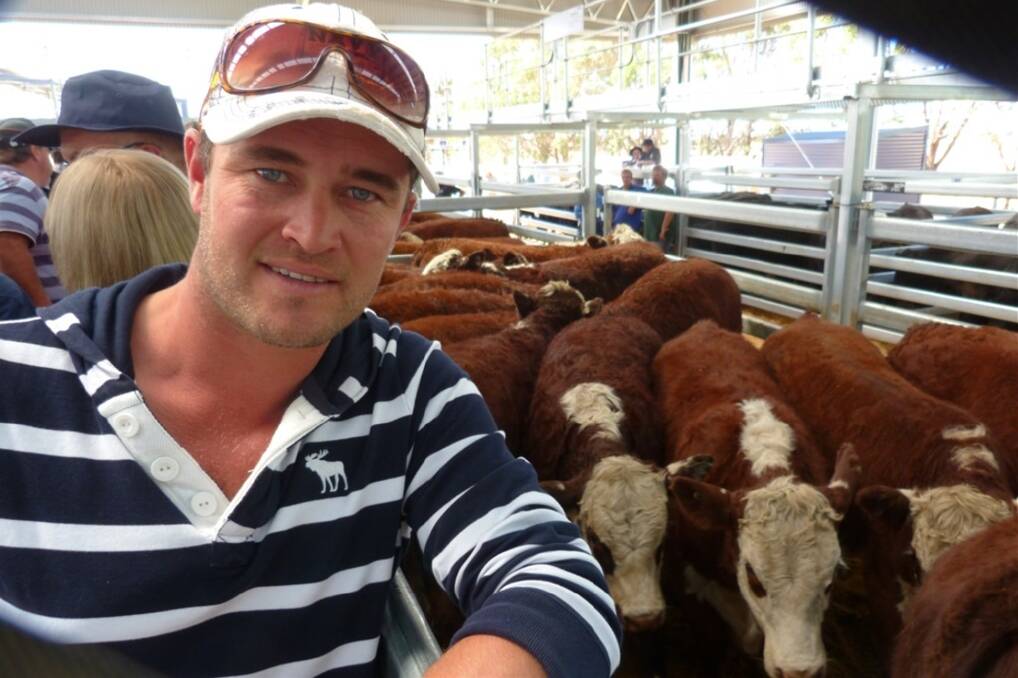 James Downham, Glenvale, Derwent Valley, with his market topping Poll Hereford-Saler steers, 405kg, that made $855 at the Roberts Powranna sale.