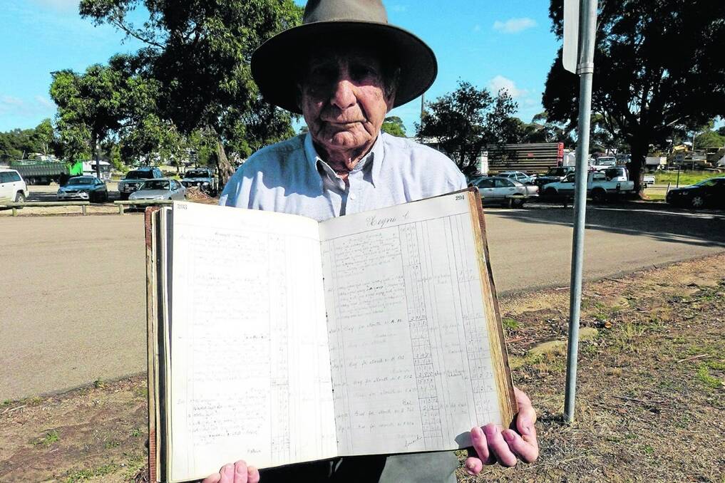 Tom Smith proudly displaying this butcher’s ledger from 1909-1913. Looking through the ledger, it is interesting to note the names of some of the prominent primary-producer families.
