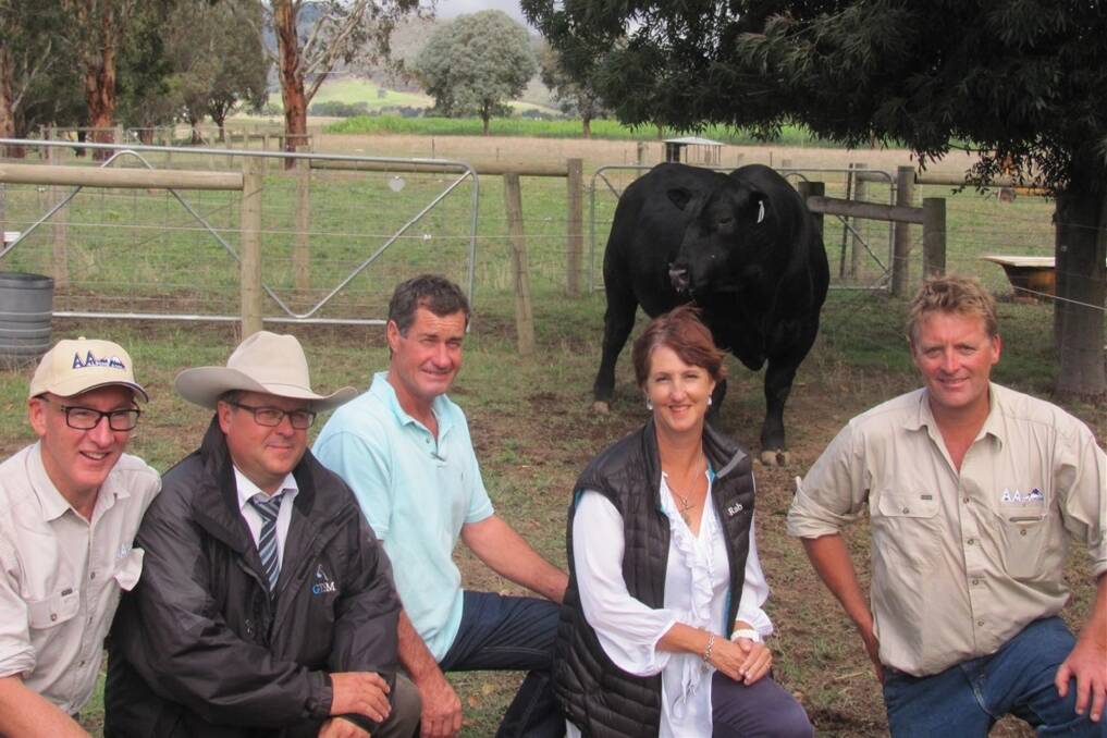 Alpine Angus principal Jim Delany with GTSM auctioneer Michael Glasser,  top-priced bull buyers Tony and Karen Golding, Little Meadows, Dardanup, WA, and Alpine stud manager Chris Oswin.