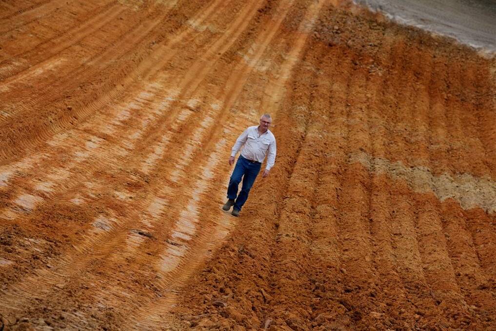 Hassad southern operations manager Peter Nilon walks across a "Claying Bed" one of the Hassad properties, a foreign owned farm in far Western Victoria.Photo by Jason South