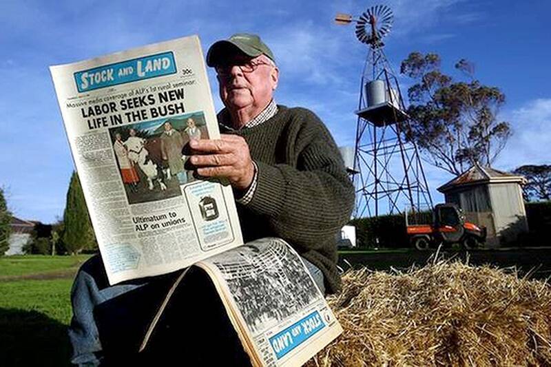 Clive McEachern reading Stock and Land newspaper on his property at Wingeel. Photo: Angela Wylie