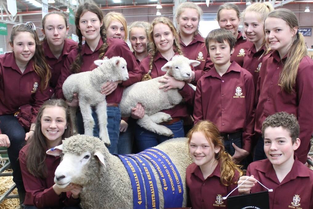 The Flinders Christian Community College team and their winning ewe and lambs.