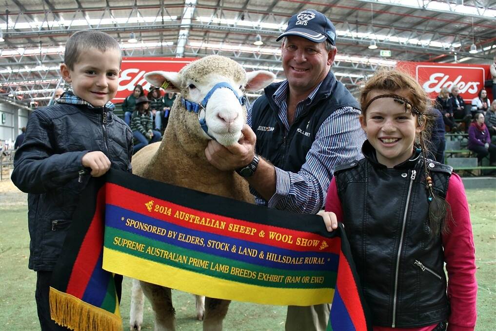 Andrew Scott, Coolac, NSW, with the family's interbreed prime lamb exhibit - a Poll Dorset ewe - and son Zac, 5, and daughter Sally, 9.