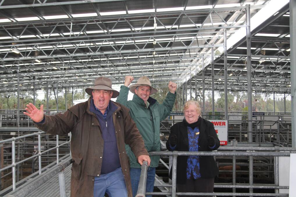 Agents association president Terry Dove, Landmark stock agent Phil Douglas and Colac Otway mayor Lyn Russell at the opening of the new roof. 