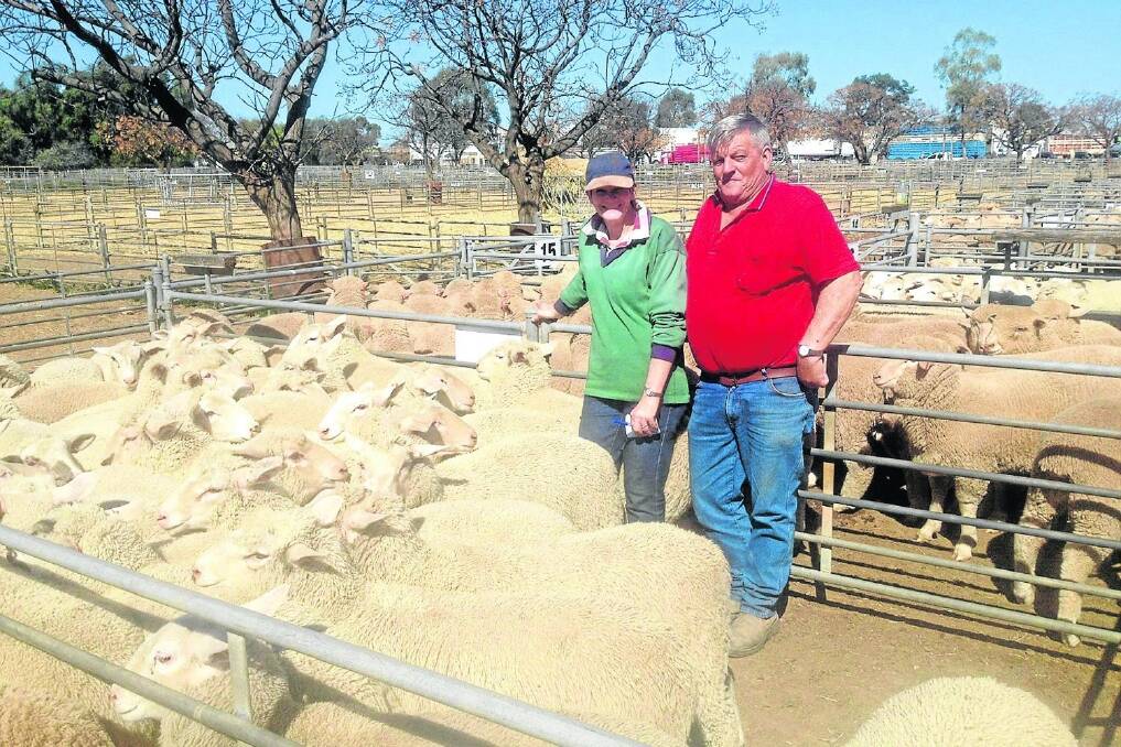 Don and Sharon Fulton, Lake Charm, with their new-season heavy export lambs which reached $130 a head at Swan Hill last week.