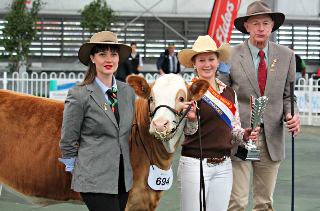 Judge Tai Snaith, Stud Beef Victoria Handlers Competition winner Ruby Canning and Ross Draper.