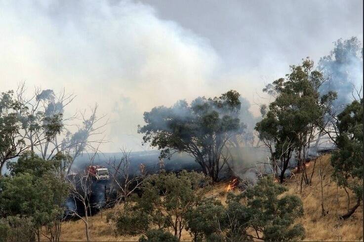 Firefighters tackle the blaze at Black Range Road, near West Wodonga earlier in the week. Photo: The Border Mail