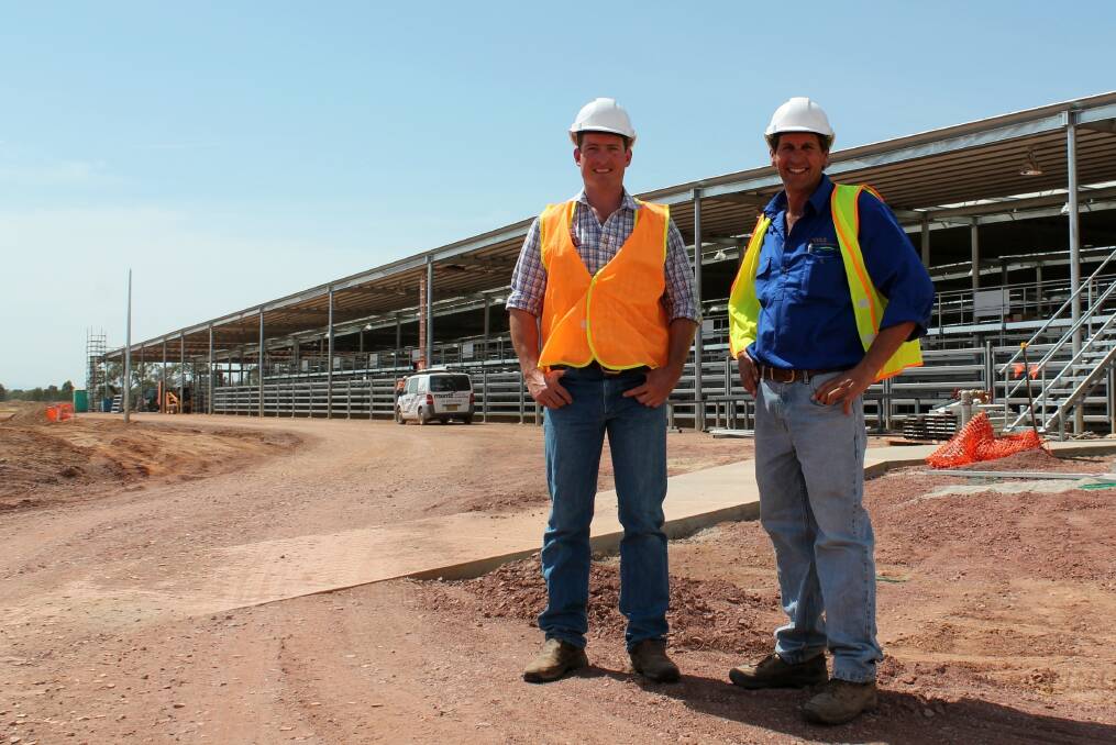 Regional Livestock Exchange operations manager Nathan Morris with Victorian operations manager James Thompson at the new NVLX.