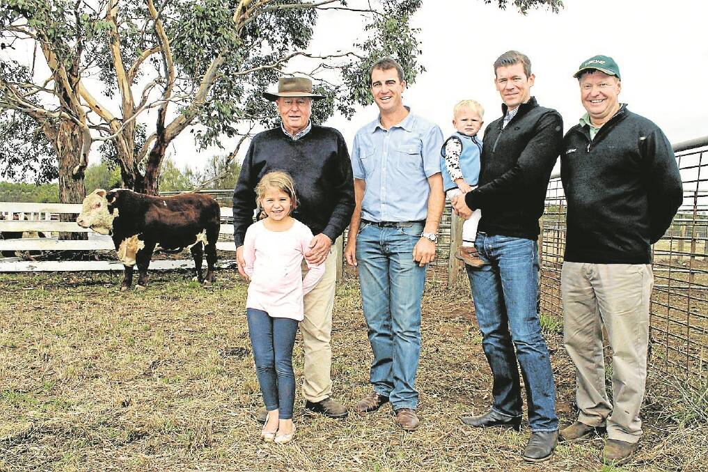David Jenkin (left) with his grand daughter Eve Jenkin; Legh Jenkin, Nayook South, Mount Gambier, South Australia, purchased the top-priced bull Lot 1 for $6500; Jonathan Jenkin, Banemore with his son Leo Jenkin and Andrew Harrison, Landmark, Casterton.