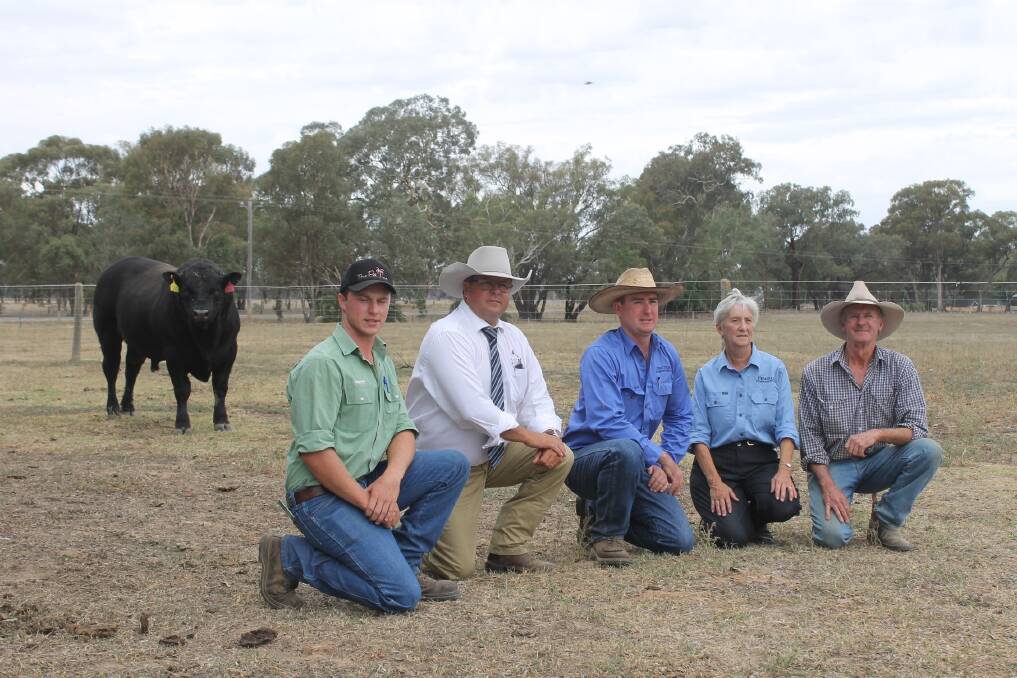 Murray Bennett (right), Landmark Wangaratta, was representing Londrigan Beef & Lamb, which purchased the top-price bull, lot 21, at $10,000. Mr Bennett is pictured with Michael Glasser (left), GTSM; stud co-principals Andrew McIntyre and Beverley McIntyre; and Des Hogan, manager of Londrigan Beef & Lamb.