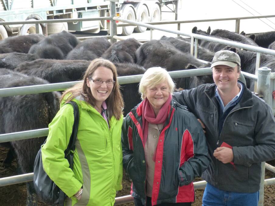 The McKenzie family, Campsie Glen Angus, sold 57 Angus steers 25 heifers at Yea. Pictured from is Paul McKenzie, mother Pam, and Andrea. Paul said they have kept their heifers for the past two years to sell the older cows, and make a younger herd. Unfortunately the poor season has led to selling the calves earlier, but the results were excellent. The steers sold to $990, and the heifers to $630.