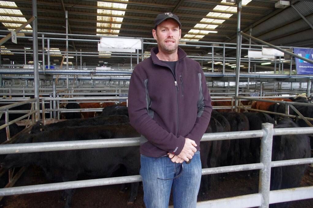Scott Anderson, Benambra, was at Friday's store cattle sale to see his family's 15-16-month-old steers sold. Clive and Diane Anderson's Angus steers, 521kg, made $1340 or 251c/kg, while their black baldy steers, 446kg, realised $1235 or 277c/kg.