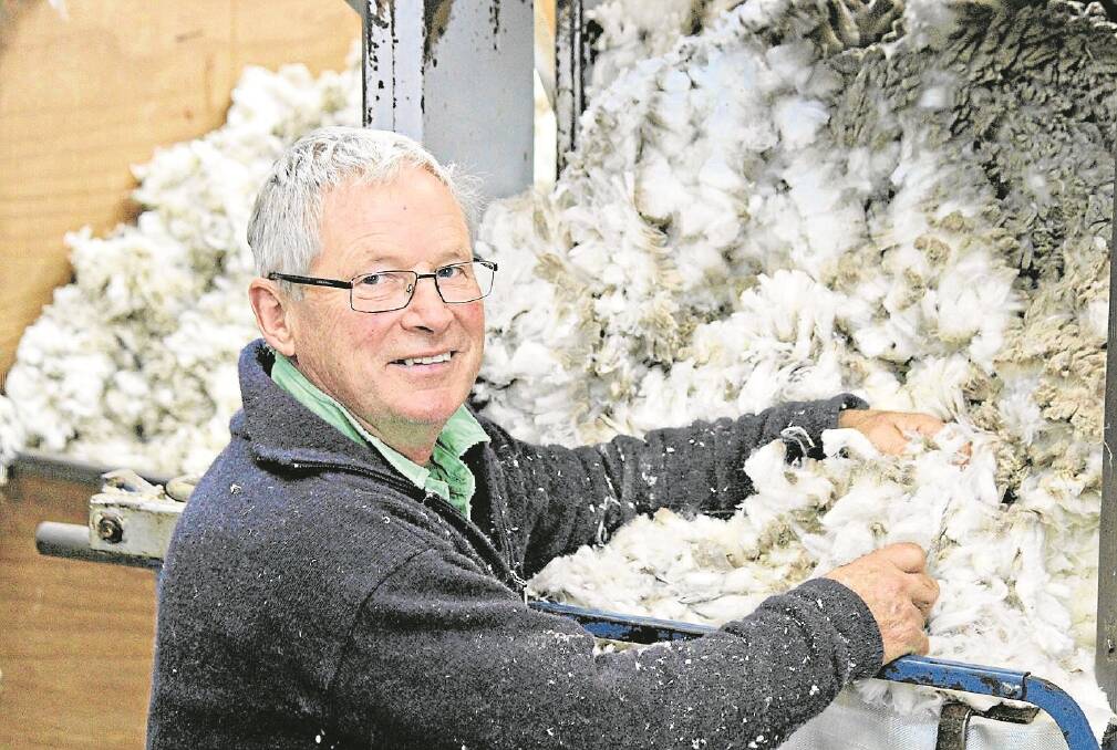 The Mountain Dam Merino Stud principal Tom Silcock inspects wool they hope to sell to AWN’s Hysport mill.