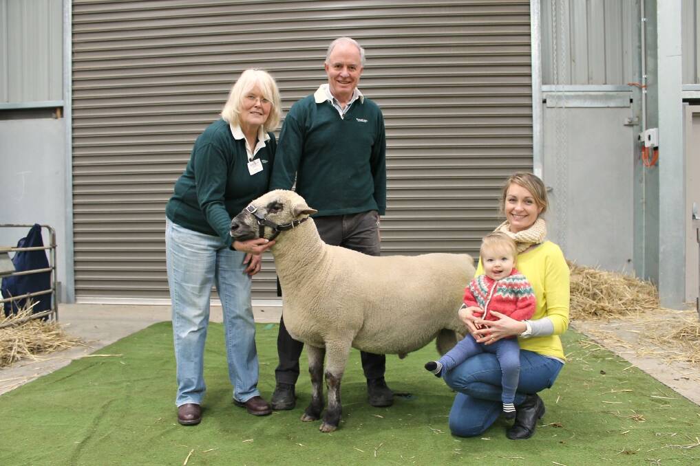 FAMILY AFFAIR: Colin, Margaret, Elizabeth, and Magnolia Chapman, pictured with their champion Dorset Down ram at Bendigo.