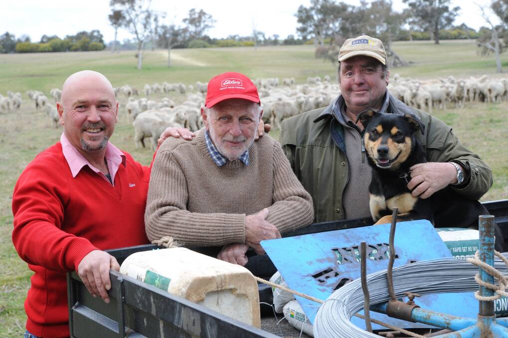 Owner, Paul Simons, (centre) “Euralie” Yass, with his Farm Manager, (at right) Malcolm Jones, Yass, Jack the dog and (left) Elders Wool Manager for Yass and Goulburn, Craig Pearsall. Mr Simmons sold 48 bales of his clip to ACS for 150c/kg premium above the current price.