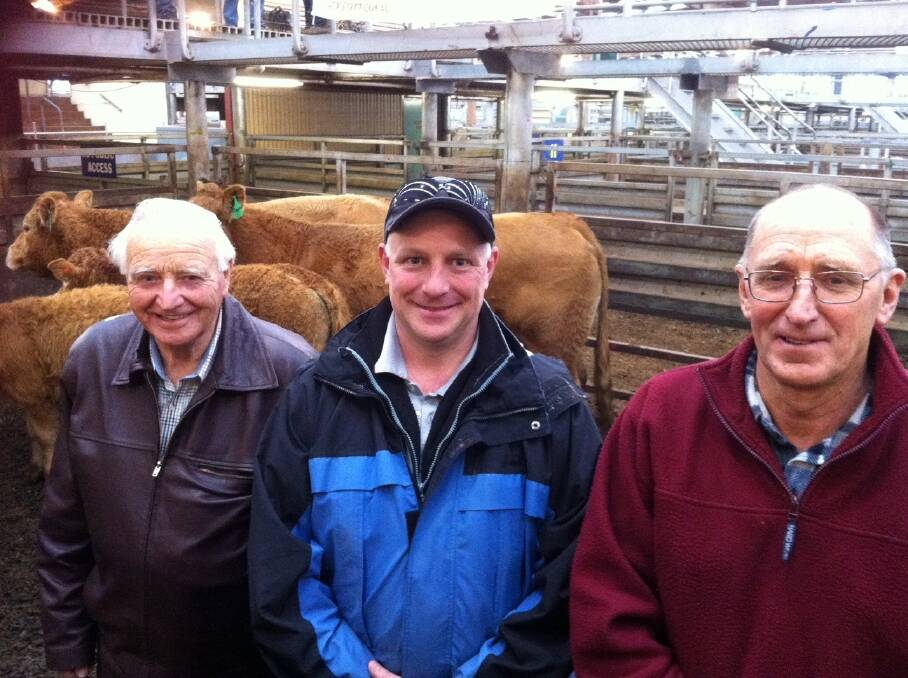 John and Damian Britt, Lillico Glen Limousin Stud, Warragul paid top price of $4500 for a cow & calf at yesterday's inaugural Limousin female production sale at Pakenham. Vendor was Gavan Budge, Limousdale, Yallourn North (right).