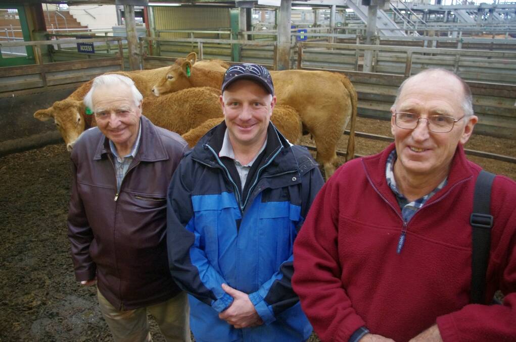 John and Damian Britt, Lillico Glen Limousin Stud, Warragul paid top price of $4500 for a cow & calf at last Thursday's inaugural Limousin female production sale at Pakenham. Vendor was Gavan Budge, Limousdale, Yallourn North (right).