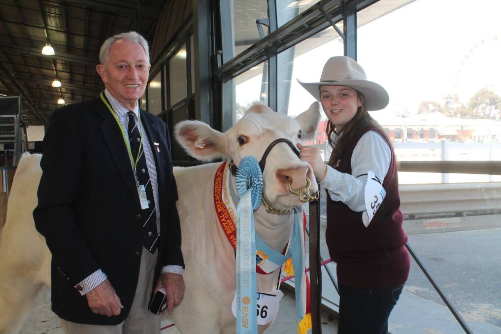 David Ashley, Morningtime, Spring Hill, with his supreme champion Beef Shorthorn exhibit (a heifer) and handler Paris Hourn, Flinders.