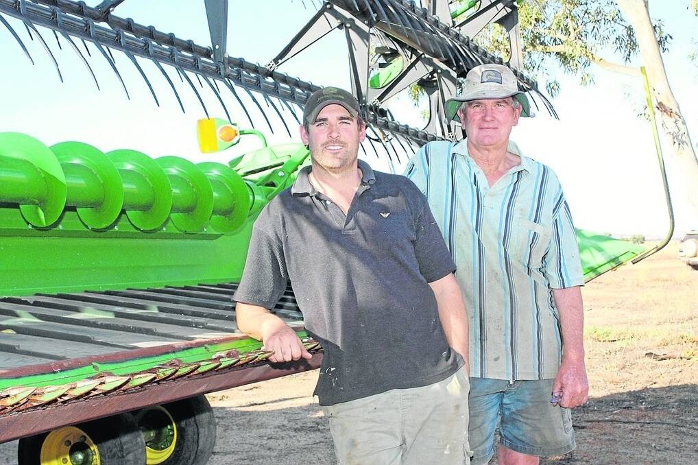 Dennis (left) and Peter Gittos of Varley wrapped up harvest prior to Christmas with below average results caused by a combination of frost, hail and a dry finish.