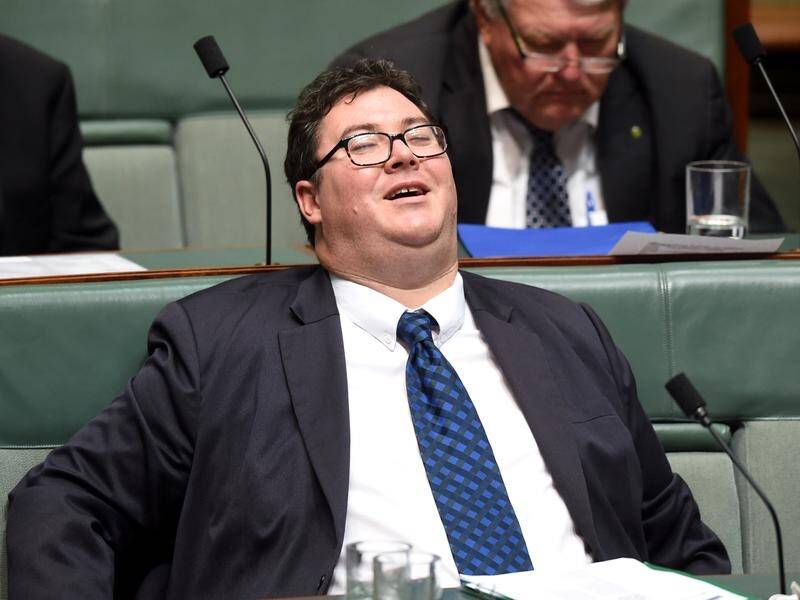 Nationals MP George Christensen refuses to apologise for posting a gun-toting photo to social media.