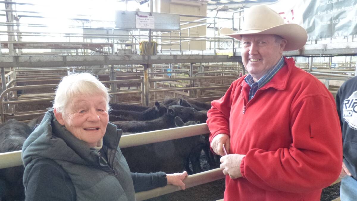 Vendor, Peter Boddy, R Boddy&Sons, Woodside, with repeat buyer, Jean Moir, Berry's Creek who purchased 44 Angus heifers for $970 at Leongatha, Thursday.