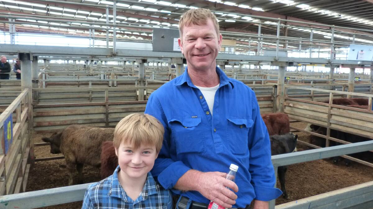 Happy to see their cattle sold was Alan Simpson, manager of Pepperhill Trading, Willow Grove. A teachers correction day gave his son Adam a chance to follow the sale at Pakenham.